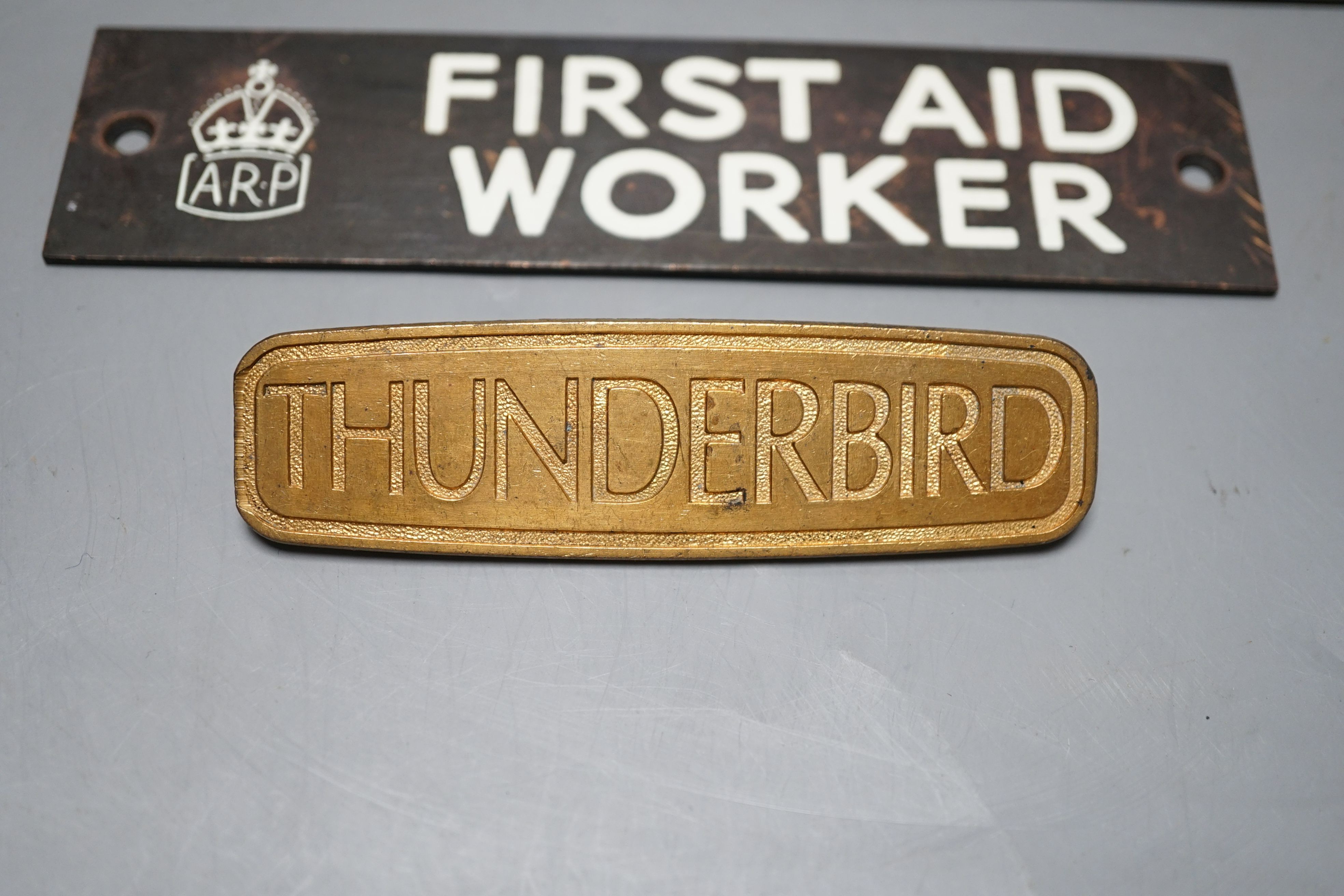 Three Air Raid Precautions signs together with a ‘Thunderbird’ sign. (4) largest 3 x 23cm